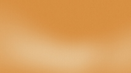 orange color abstract background with a fine-grained texture and a soft light gradient from dark to light.