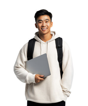 Happy and smiling Asian teenage male holding laptop and carrying backpack, isolated on white or transparent background