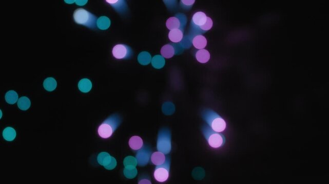 Abstract bokeh background of celebration fireworks exploding at night