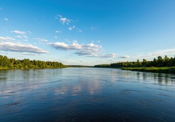 Fototapeta premium Stunning panoramic landscape showing the tranquil meeting of a flowing river with the vast, calm surface of a freshwater lake under blue skies ,nature ,geography ,remote