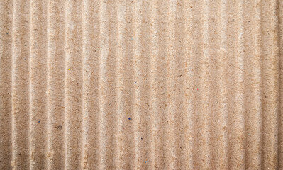 Seamless Corrugated Cardboard texture showing wavy inner layers. This durable Corrugated Cardboard background is ideal for packaging mockups, eco-friendly themes, and industrial design.