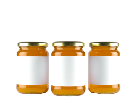 Three glass jars filled with orange substance and white labels on a black background