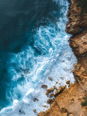 Obraz premium Scenic coastal landscape showcasing a beautiful rocky shore with a tranquil body of water, offering a peaceful and remote natural escape