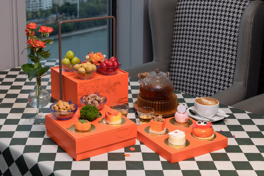Exquisite Afternoon Tea Desserts and Floral Tea, Modern Minimalist Style, High-Rise City Restaurant