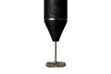 Black milk frother preparing frothed milk for coffee