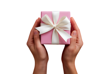 The hands hold a present which is pink with a white bow in front of the plain white background