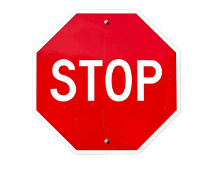 Red octagon sign with white "STOP" against black. Shows texture & slight wear from outdoor exposure