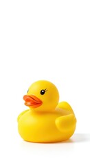 Fototapeta premium Bright yellow classic toy rubber duck, floating playfully on a perfectly clean white background, ready for fun bath time activities ,white background ,isolated ,toy