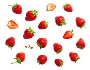 Red, ripe strawberries scattered on a black background. Slice and whole, vibrant, juicy fruit display