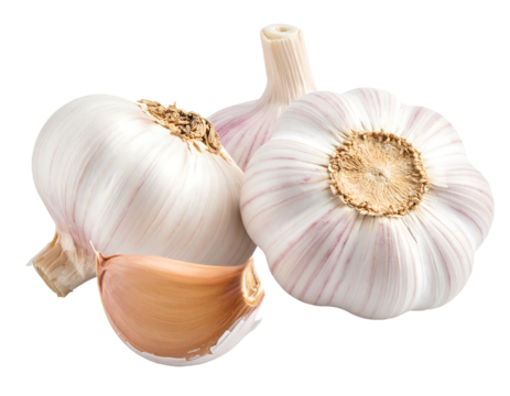 Three bulbs of garlic and one clove, showing layered texture on a black background