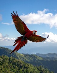 A vibrant macaw soaring against a backdrop of mountains and a cloudy sky