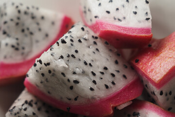 Cut pieces of dragon fruit ready for tasting in a bowl