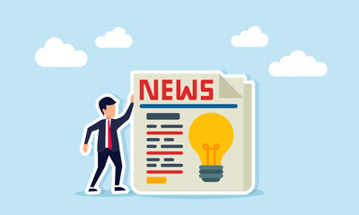 Businessman standing beside newspaper with light bulb symbolizing ideas and innovation from print media