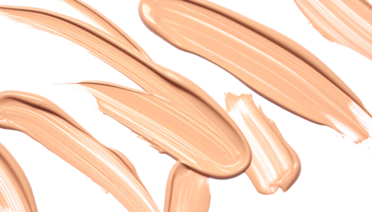Beige cosmetic foundation smears and strokes of makeup product, top view, on transparent and white background