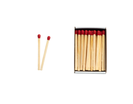 Matches are aligned with the matchbox which is filled with wooden matches on a dark background