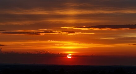 Spectacular sunset background featuring deep orange and amber tones illuminating expansive, wispy stratocumulus clouds in the vast heavens ,landscape ,expansive ,sky