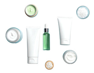 Overhead view of skincare products (tubes, jars, bottle) on a solid black background