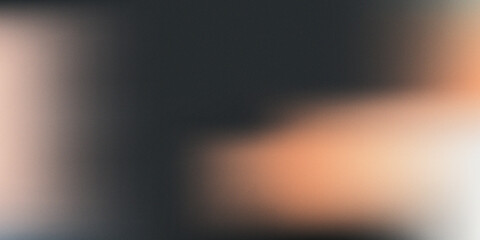 Abstract blurry background with warm orange and gray tones