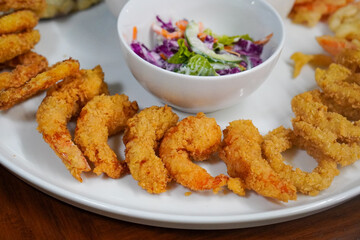 Snack Platter, captured on October 24, 2025. Crispy fries, onion rings, nuggets, and sauces served on a wooden board, tasty assortment perfect for sharing and casual dining visuals
