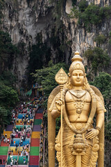 Fototapeta premium Batu caves murugan statue and colorful temple steps