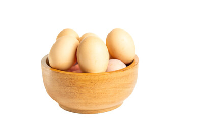 Chicken eggs on the wooden bowl. Isolated eggs on white background