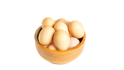 Chicken eggs on the wooden bowl. Isolated eggs on white background
