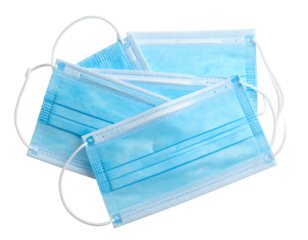 Stack of light blue, disposable face masks with white elastic ear loops, against a solid black backdrop