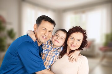 Fototapeta premium Happy young family with children having fun at home.