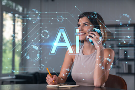 Smiling businesswoman in casual wear holding using smartphone typing at office workplace with notebook. Concept of distant work, business education. Ai icons hologram
