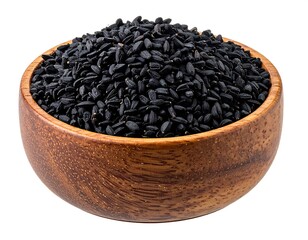 A wooden bowl overflowing with shiny, black seeds against a white background