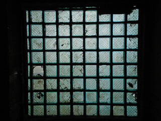 Close up photography of a glass texture inside an old museum in downtown Bogotá, Colombia. Concept of architecture and copy space