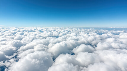 Fototapeta premium Fluffy white clouds blanket sky, creating serene and calming atmosphere