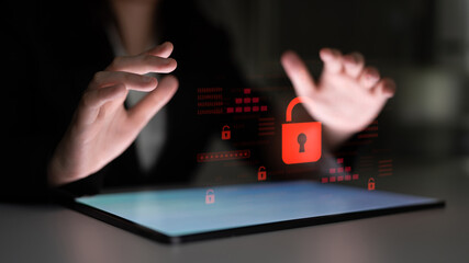 Digital security concept illustrating a cybersecurity breach, with a red unlocked padlock...