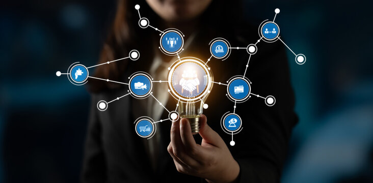 An insightful depiction of business innovation, featuring a light bulb and network icons that symbolize creativity, strategy, and growth in various industries. Crux