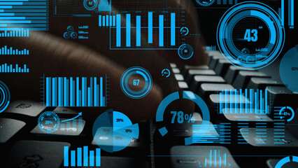 This image features an overlay of vibrant data visualization graphics on a keyboard, symbolizing the intersection of technology and business analytics in a modern workspace. Xenic