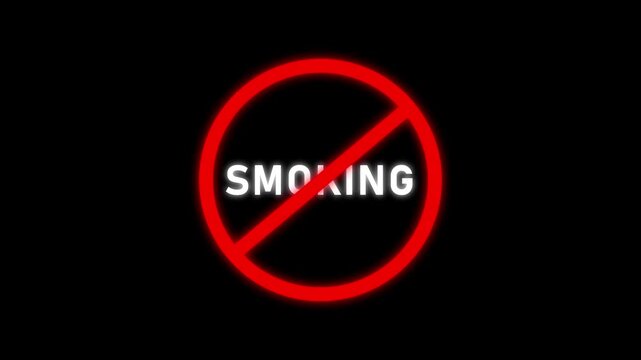Red prohibition sign with the word SMOKING in white neon letters on a black background smoking
