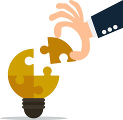 hand placing the final puzzle piece into a light bulb. Businessman with puzzles bulb idea. businessman insert puzzle piece into lamp idea. creative idea concept