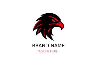 A circular logo of a red and black eagles head