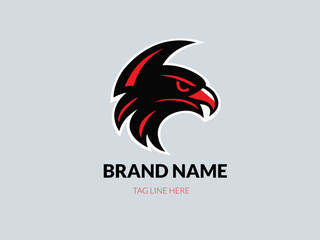  A circular logo of a red and black eagles head