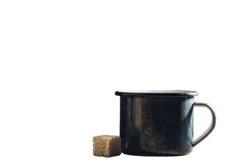 Metallic Enamel Mug And Sugar Cube Isolated On Black Background With Dramatic Lighting