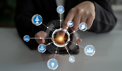 A professional user engages with a smartphone, surrounded by digital icons representing connectivity and technology, emphasizing modern business practices and innovation. Crux