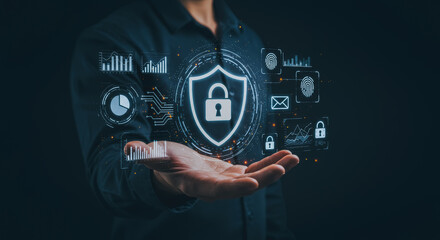 A person's hand, representing security and protection, interacts with holographic elements. It reflects the concept of guarding vital information.
