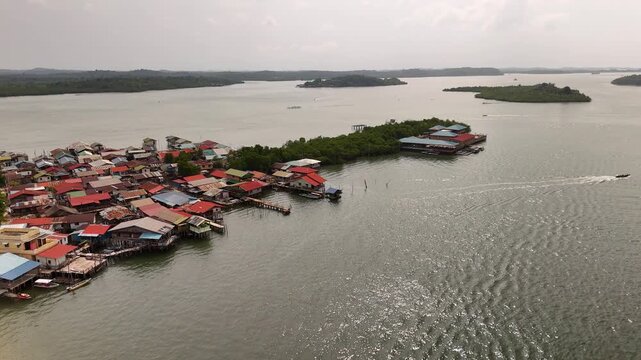 aerial view of a floating village on batam island riau islands indonesia known as kampung tua showcasing traditional coastal life culture and community on the water