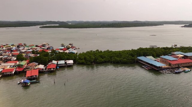 aerial view of a floating village on batam island riau islands indonesia known as kampung tua showcasing traditional coastal life culture and community on the water