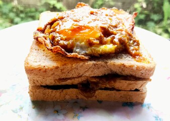 Fried egg on bread, outdoor Chiangmai Thailand.