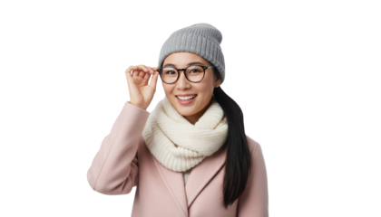 Smiling Asian Chinese woman wearing winter fashion adjusts glasses.