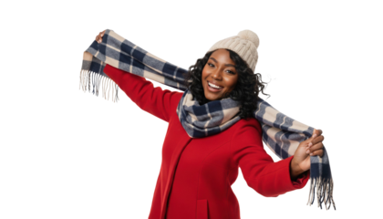 Cheerful African American woman wearing red coat and scarf for winter fashion catalog or holiday ad campaigns