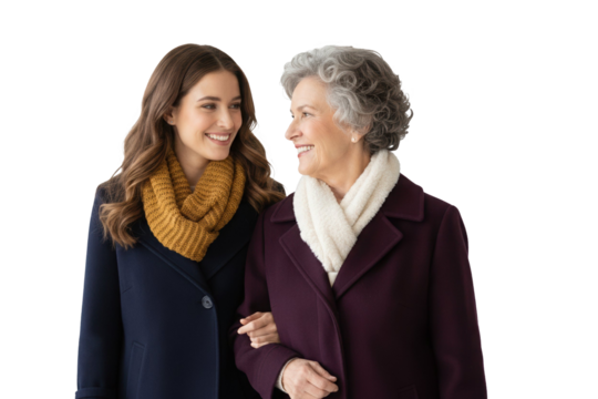 Stylish granddaughter and senior grandmother share a warm moment, embracing family love and connection