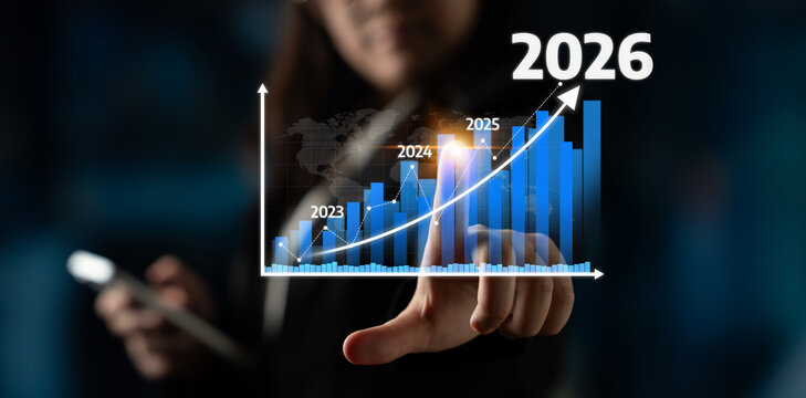 Businesswoman pointing at a digital graph highlighting growth projections from 2023 to 2026. The image signifies progress and future potential in finance. Tessel