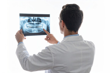a dentist looking at a dental x-ray